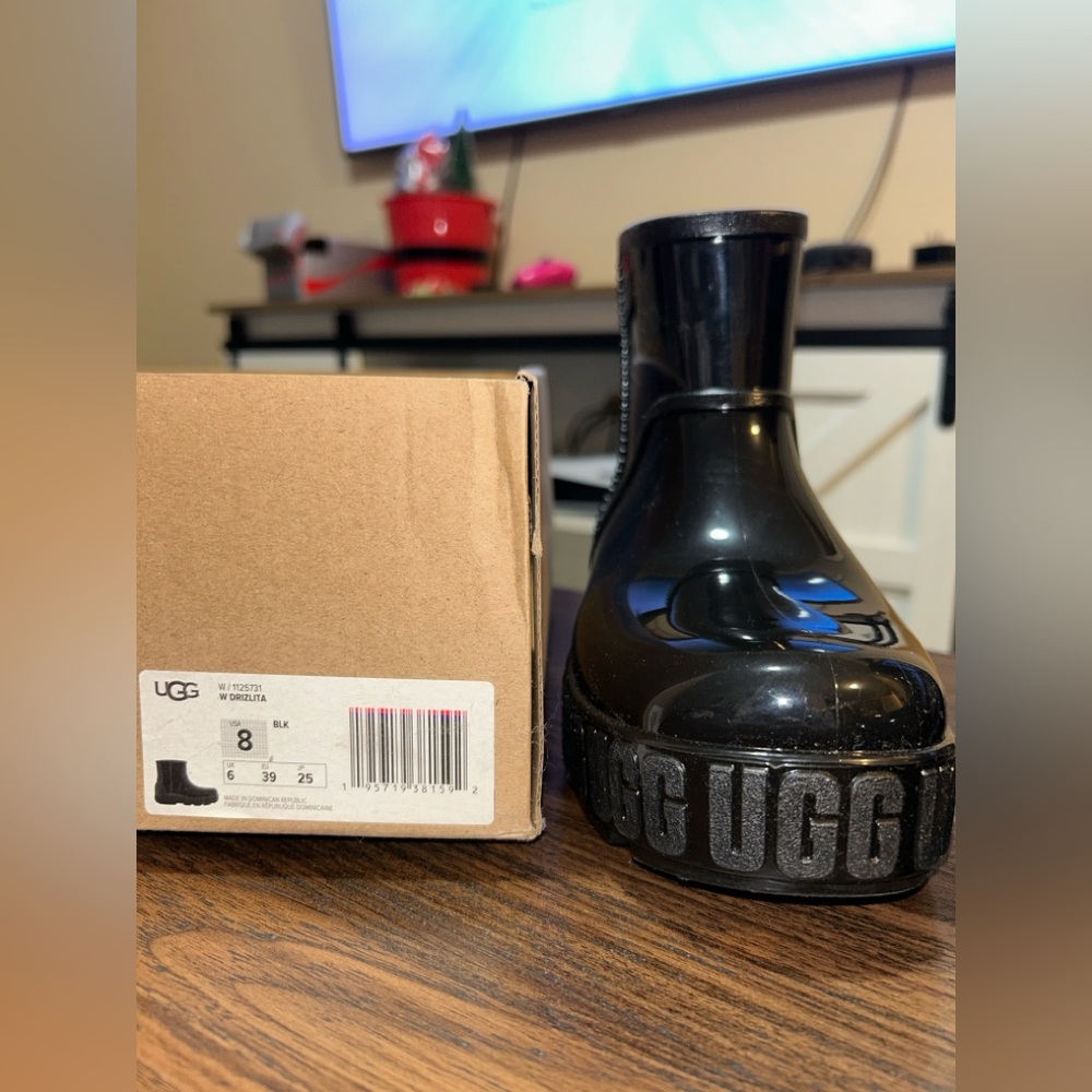 Authentic UGG rain boots, size 8.